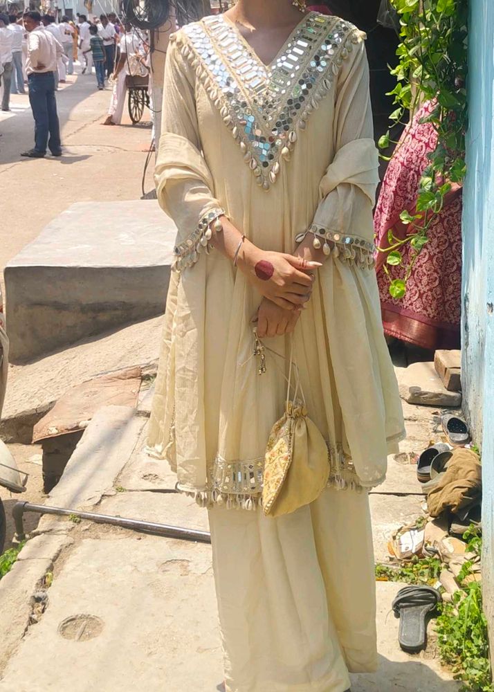 cowrie shells and mirror work kurta set