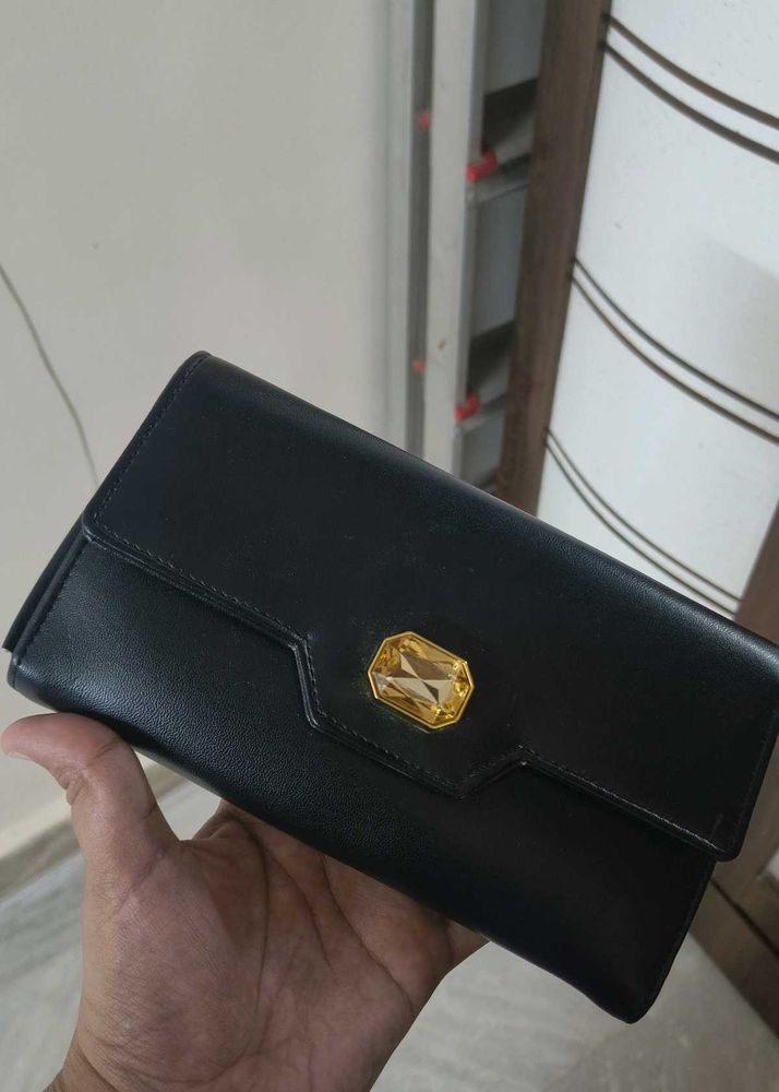 Elegant Black Wallet with Gemstone Accent