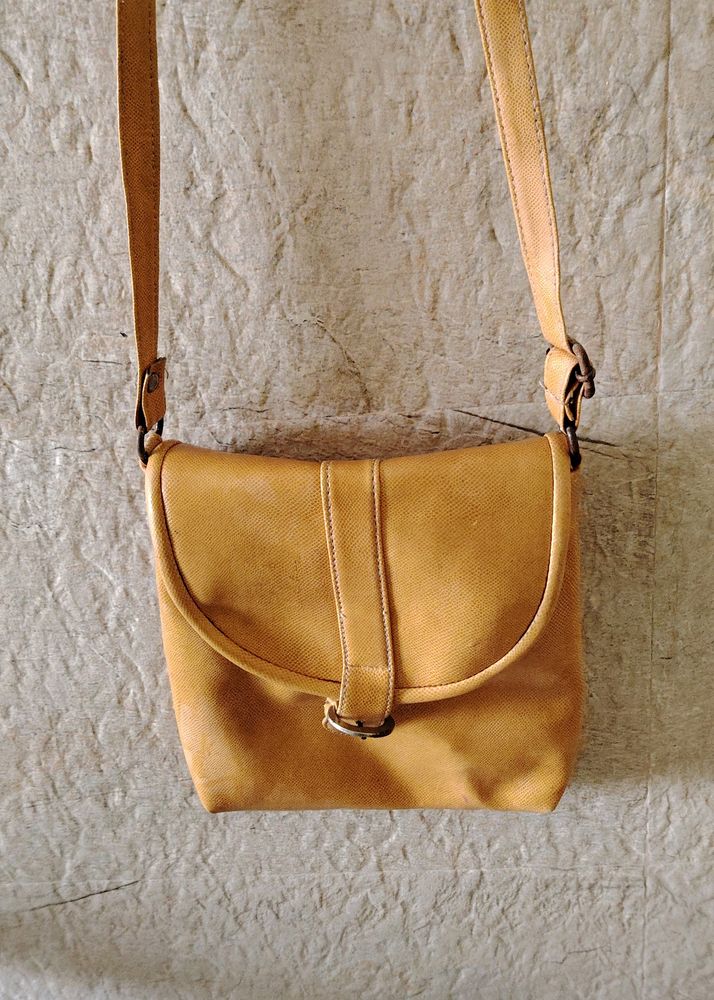 Mustard Sling Bag. Looks Very Good