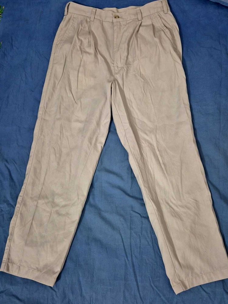 Classic Cream Pleated Trousers