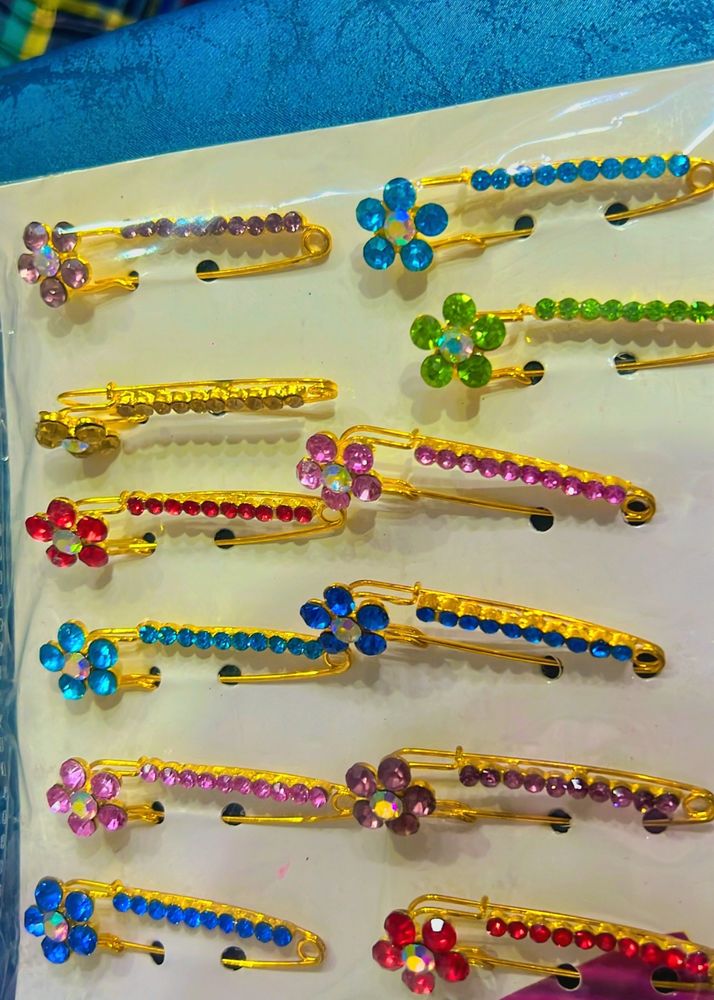 broches pins 50 rupees each piece