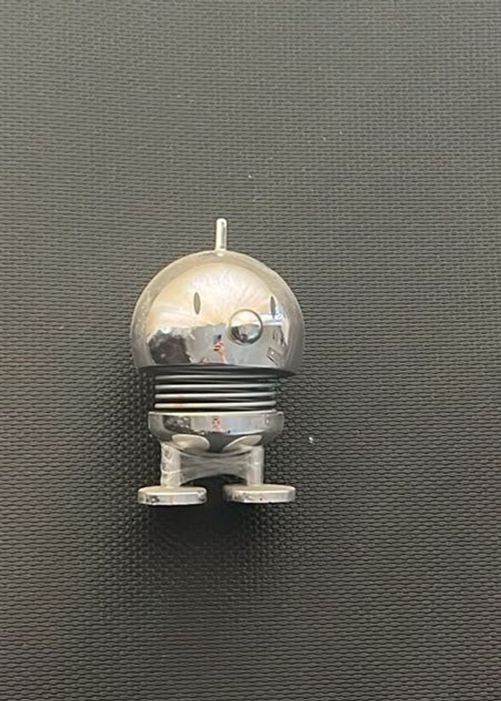 Silver Robot Figurine