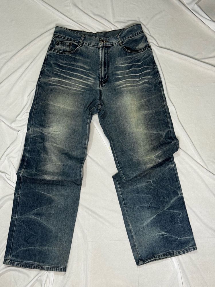 Distressed Blue Denim Jeans
