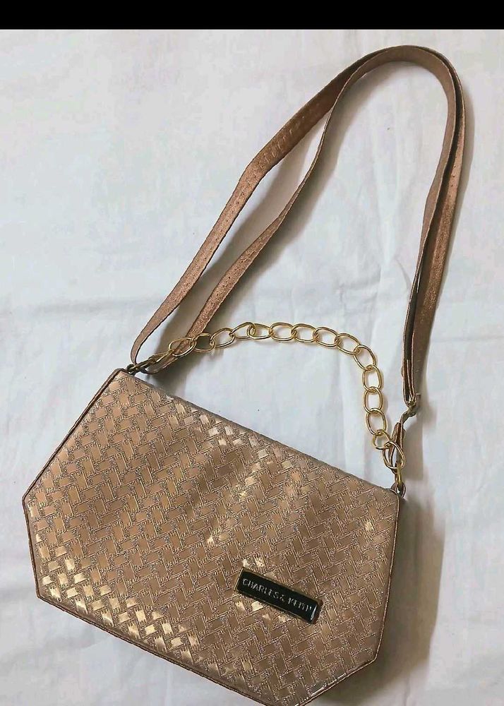 Chic Rose Gold Shoulder Bag with Chain Accent