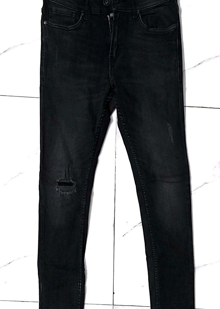 Distressed Black Skinny Jeans