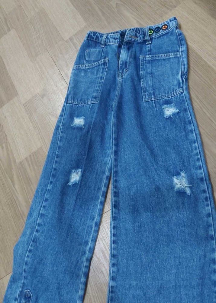 Ripped Wide Leg Jeans with Smiley Detail