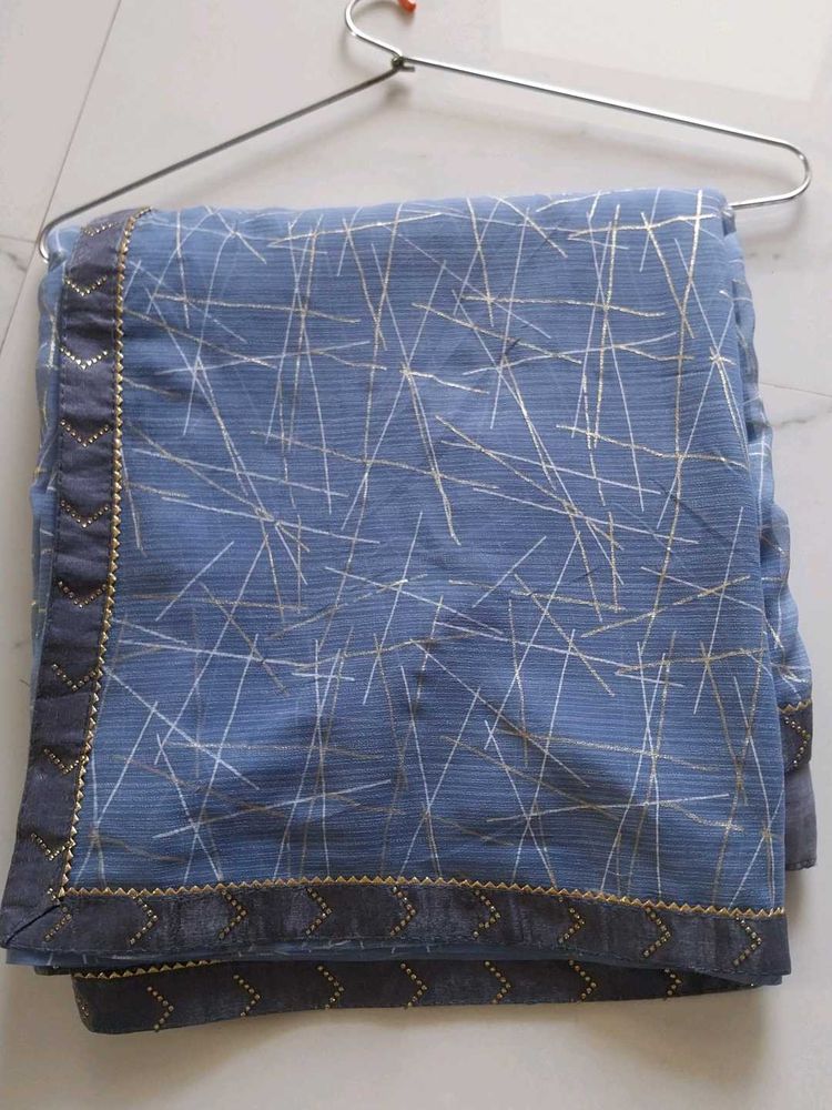 Elegant greyish Blue Saree with Golden Lines