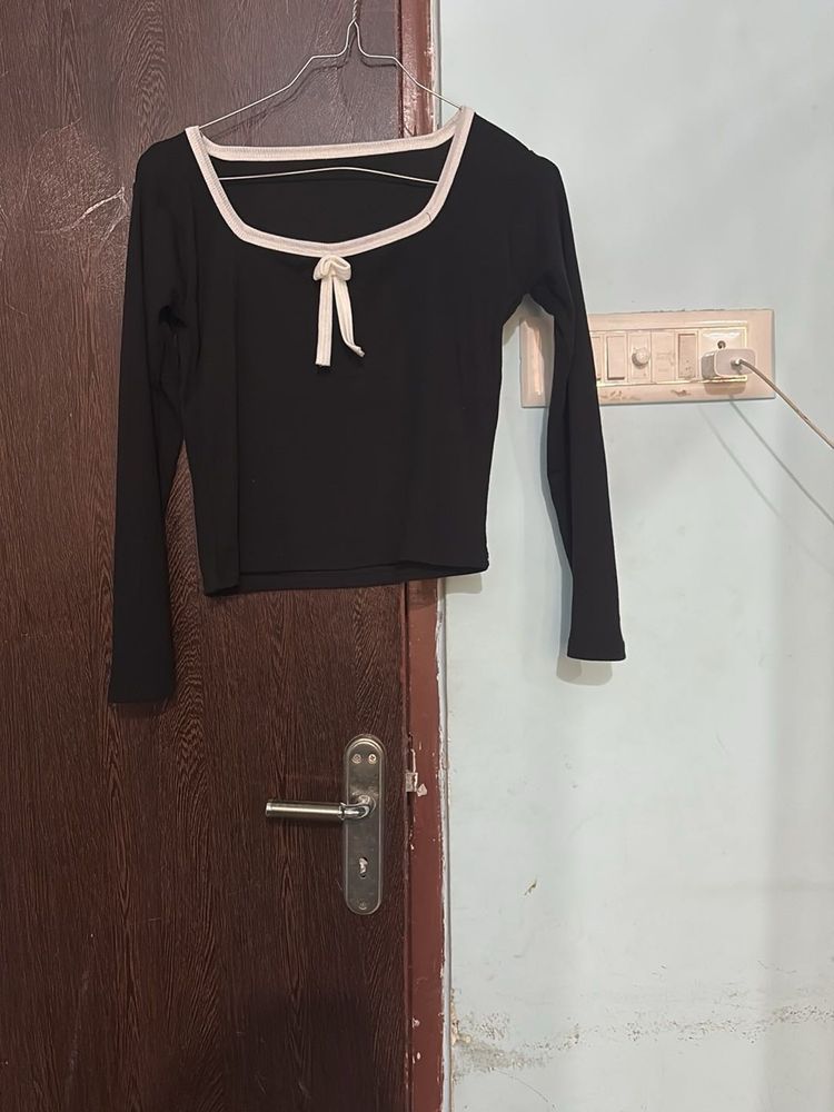Chic Black Long Sleeve Top with Bow Detail