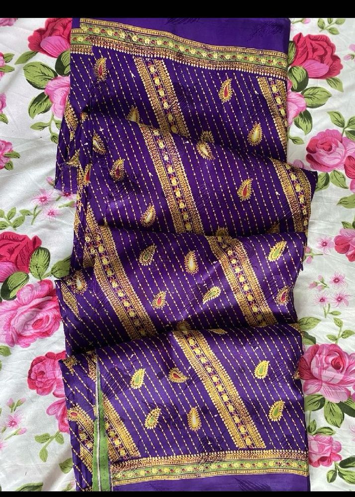 Vibrant Purple Saree with Gold Embroidery