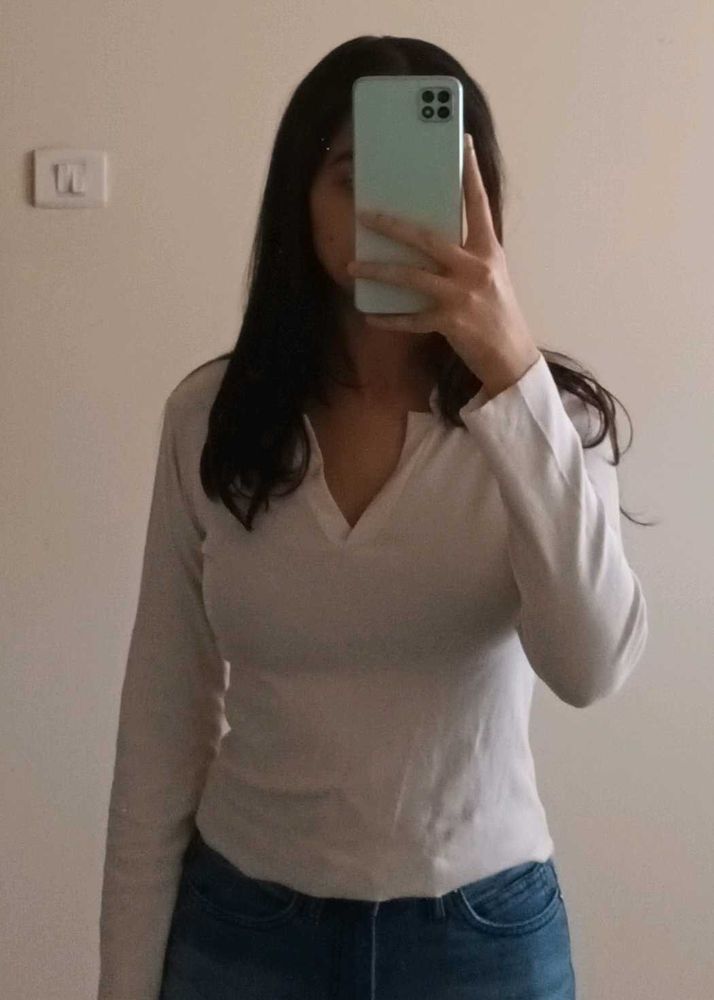 cream long sleeve collared top
