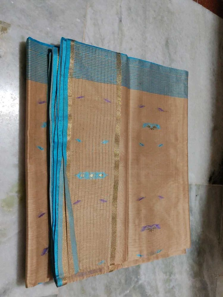 Elegant Tan Saree with Blue Border