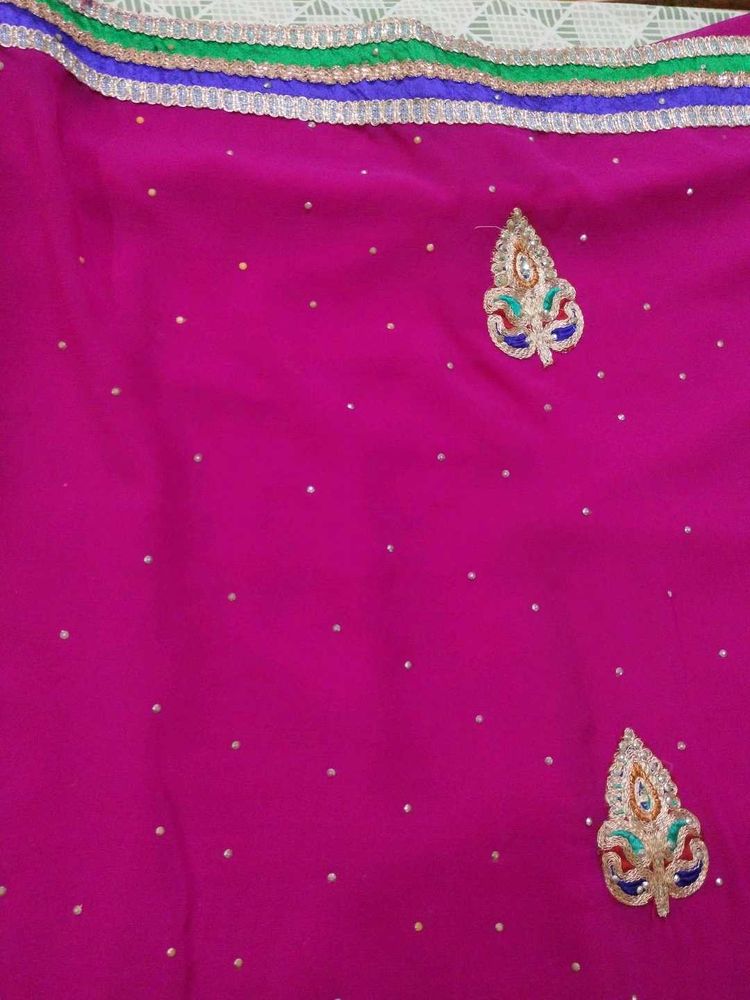 Vibrant Pink Embroidered Saree