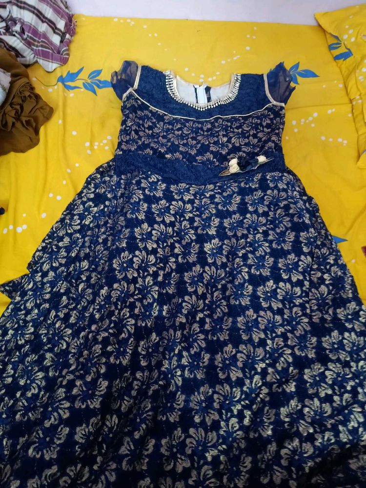 Blue Gown With Flowers Design
