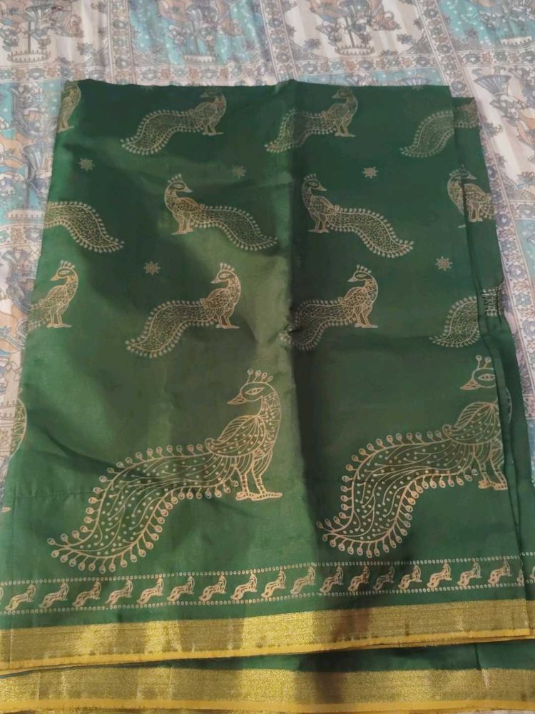 Elegant Green Saree with Peacock Print