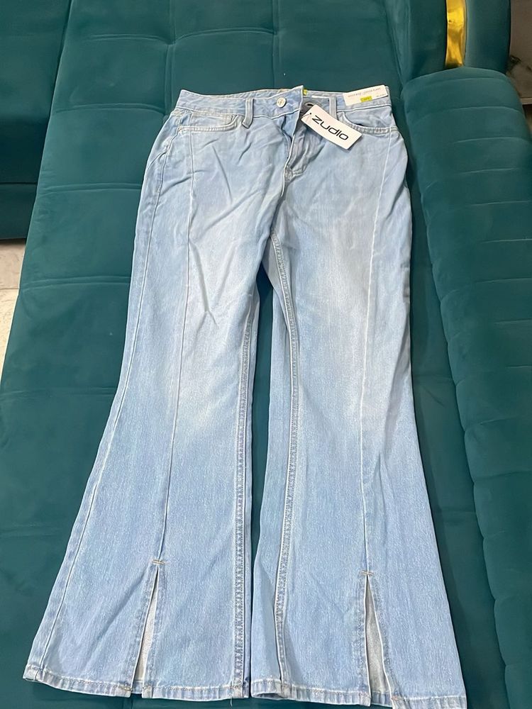 Light Wash Flared Jeans with Side Slits