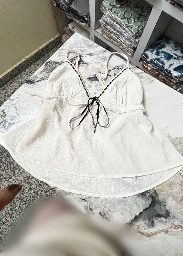 Chic White Cami Top with Black Trim
