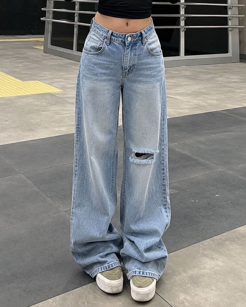 washed out distressed Blue baggy Jeans