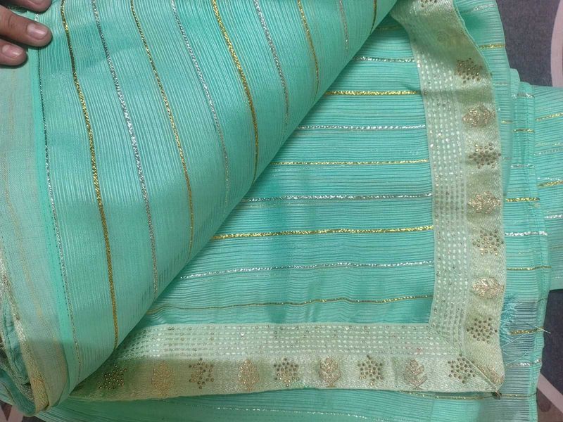 Beautiful Teal Saree with Gold Stripes