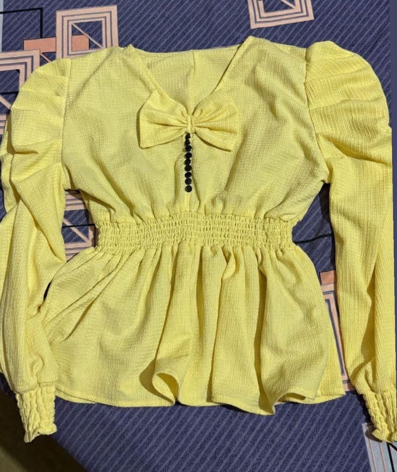 Chic Yellow Peplum Top with Bow Detail