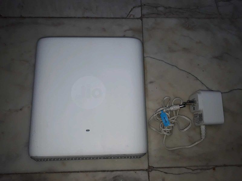 JIO Air Fiber router with adaptor