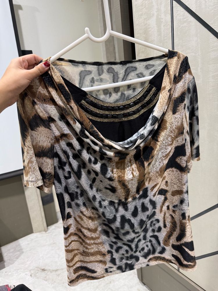 Chic Animal Print Top with Embellished Neckline