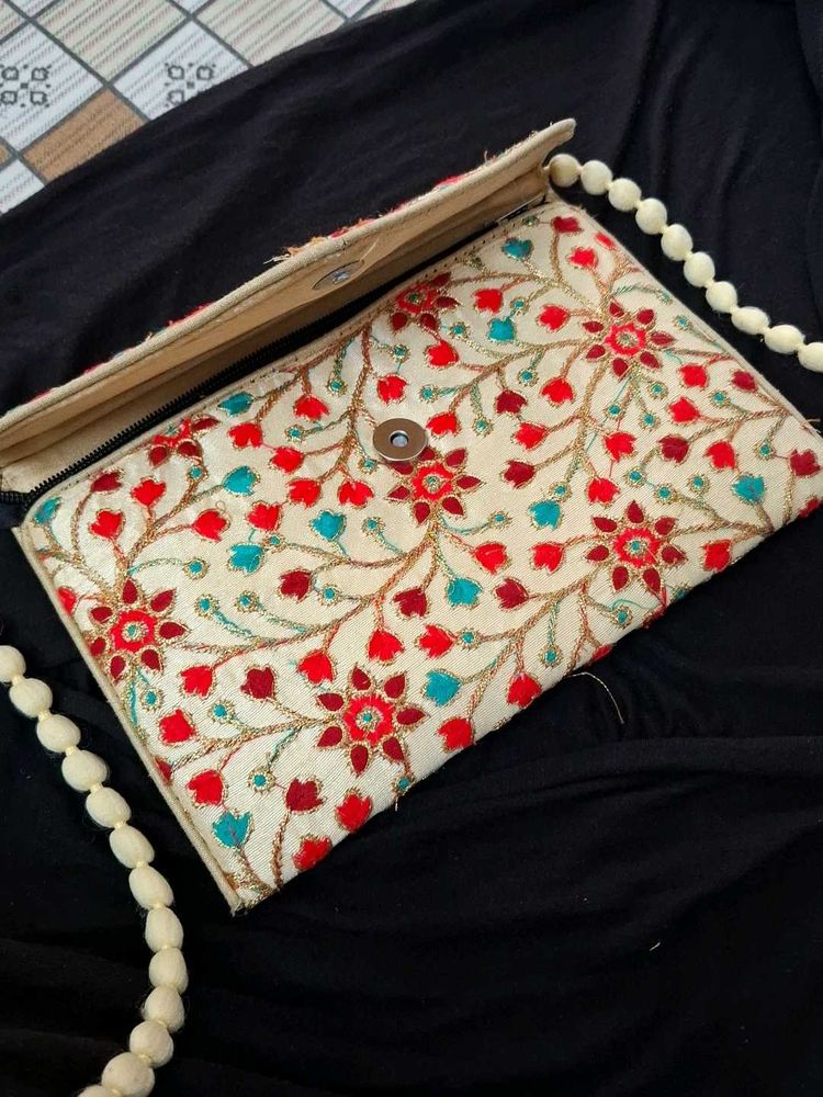 Embroidered sling Bag