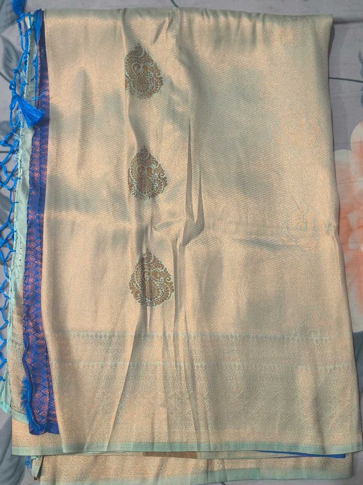 Elegant Cream Saree with Blue Border