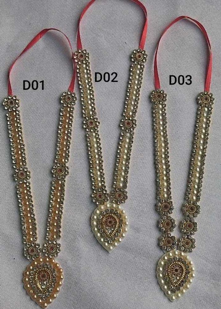 Fancy Pooja Articles. Haar For God Idols.