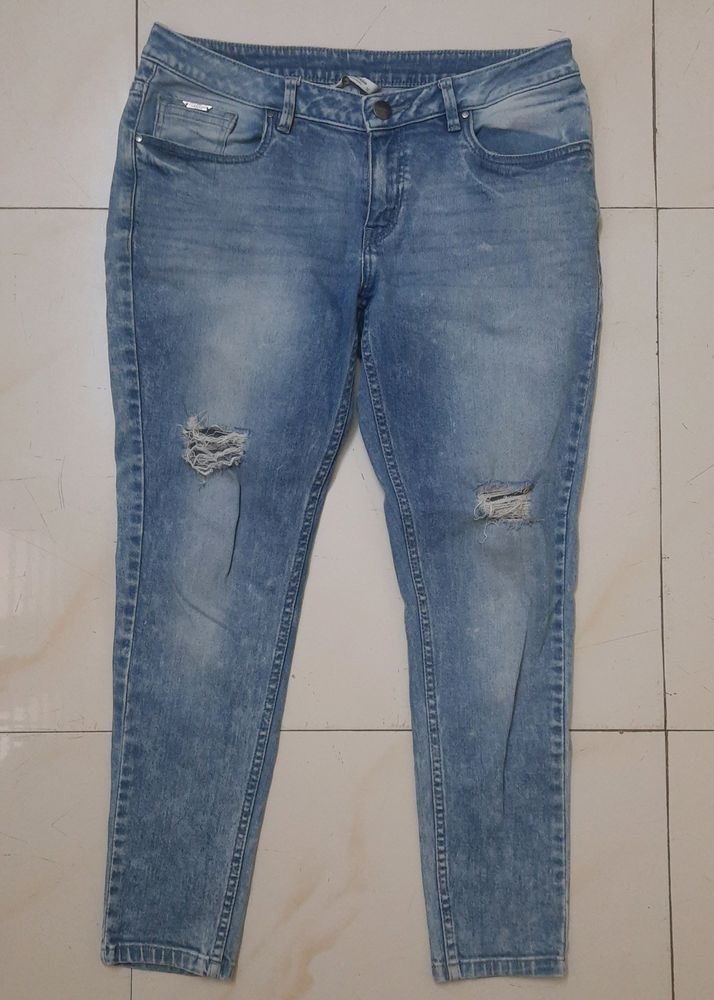 Low Rise Blue Ripped Demins