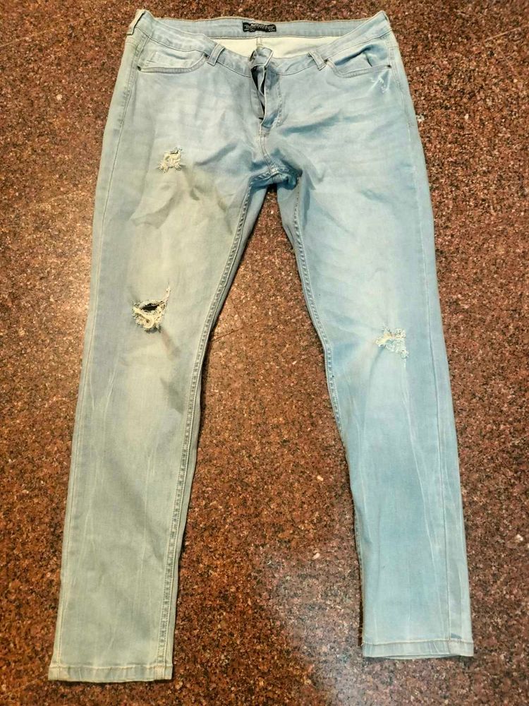 Light Wash Distressed Denim Jeans