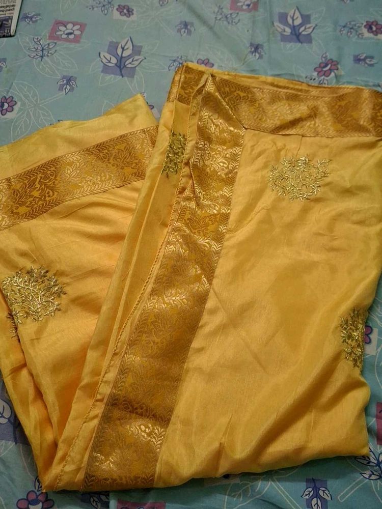 Elegant Yellow Silk Saree with Gold Border