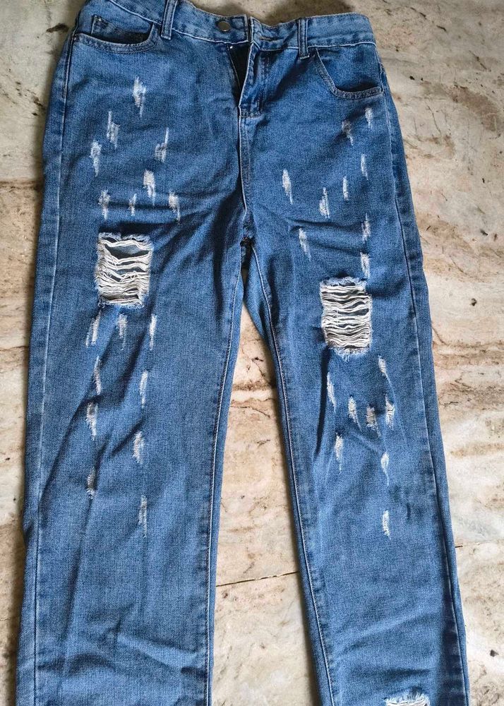 Distressed Blue Denim Jeans