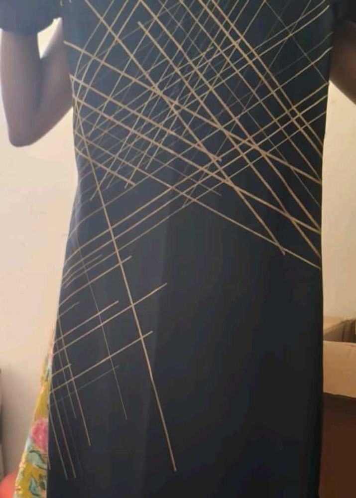 Stylish Black Tunic with Gold Line Art