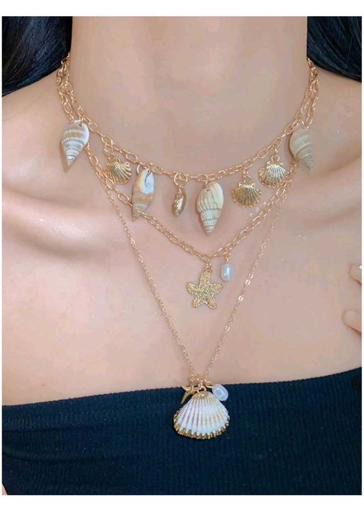 Boho Seashell Layered Necklace and rings from sava