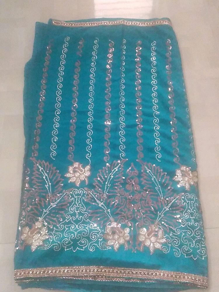 Sequins Saree With Blouse And Petticot.