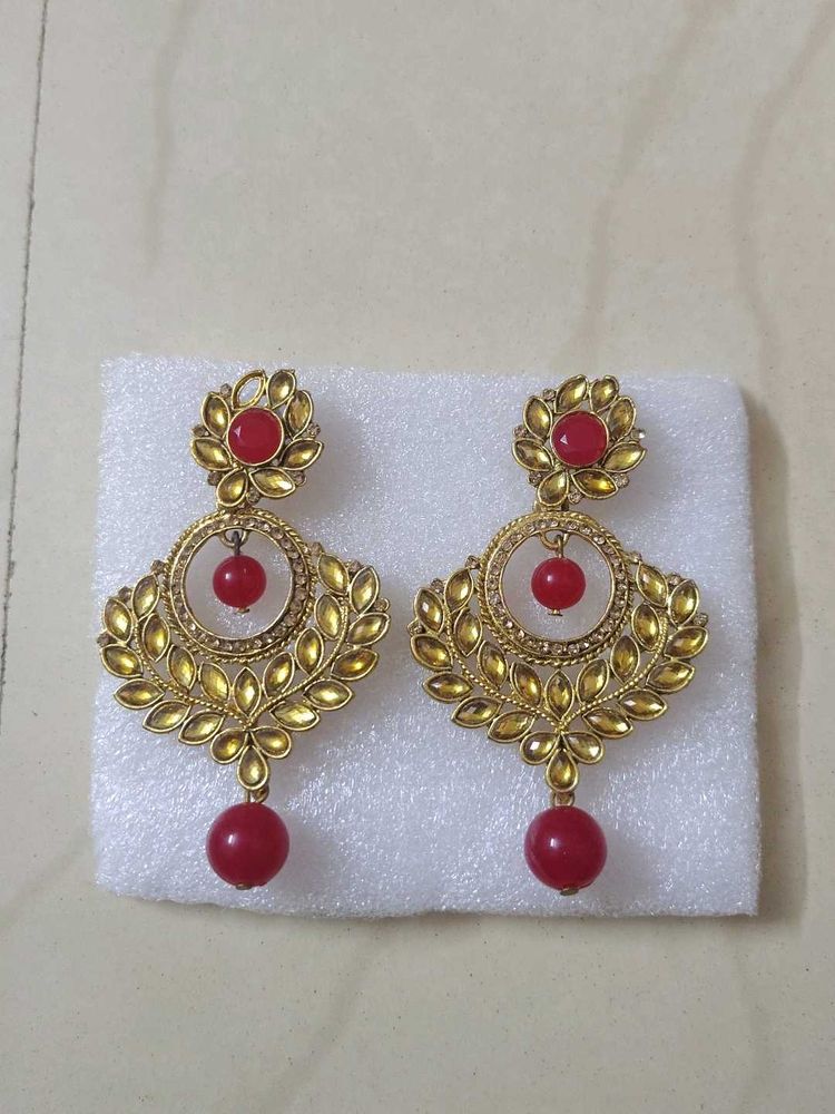 Beautiful Earrings with one stone missing