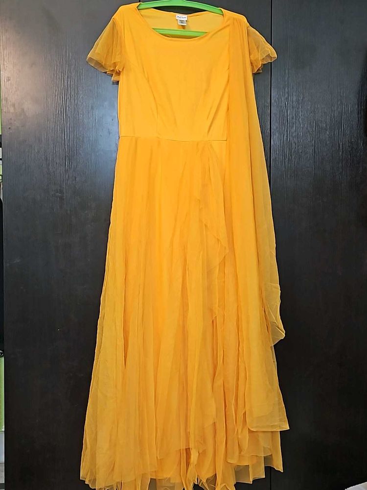 Beautiful Yellow Partywear Gown With Net Pallu