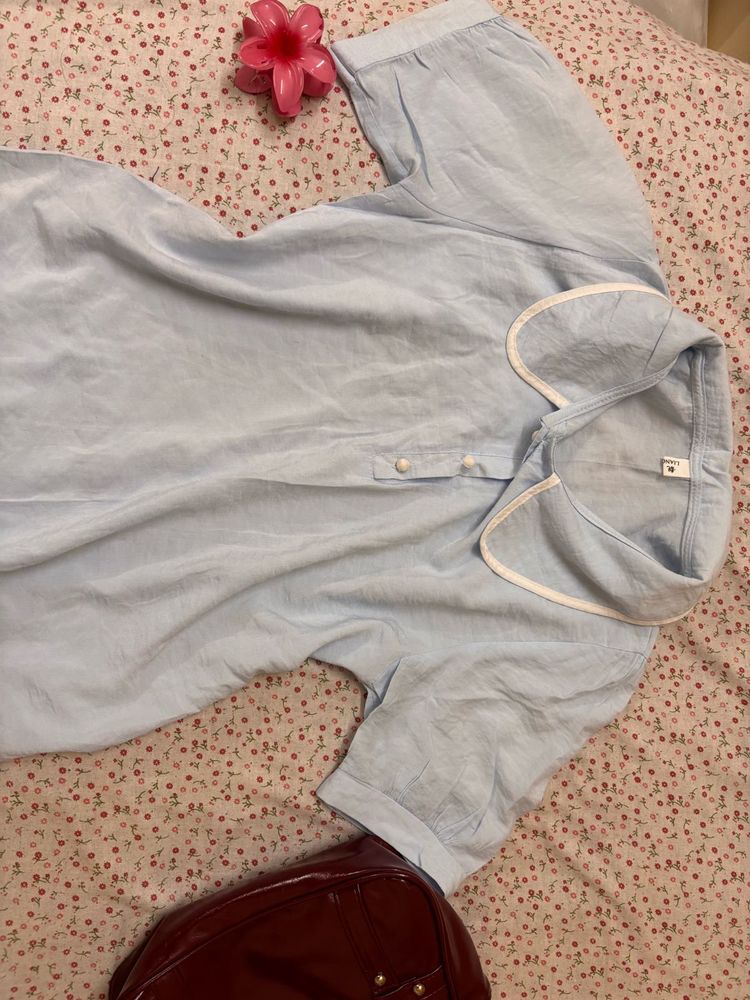 Blue top with White Trim