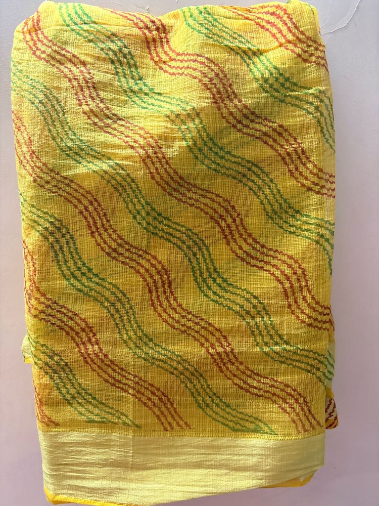 Vibrant Yellow Saree with Wave Pattern