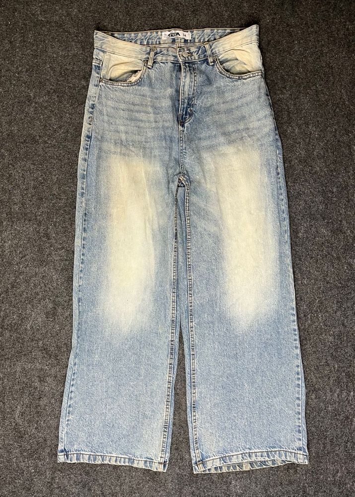 lite used blue baggy jeans