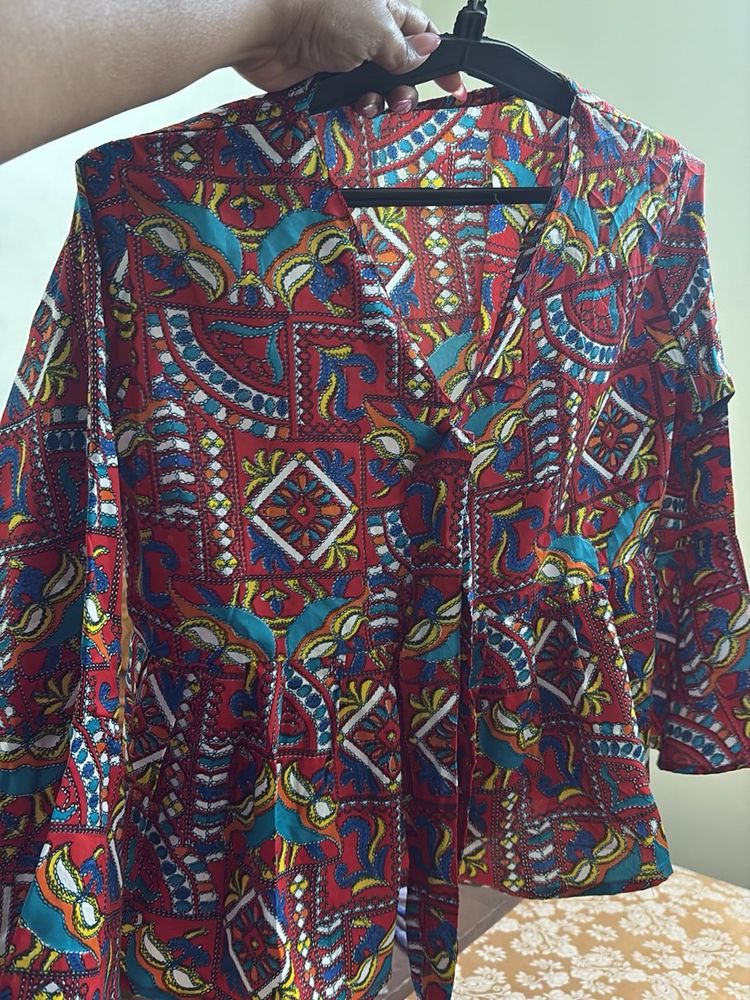 Vibrant Ethnic Print Peplum Top