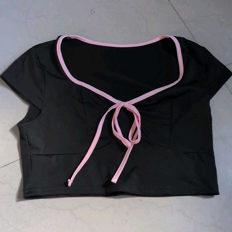 Cute black crop top with pink trim