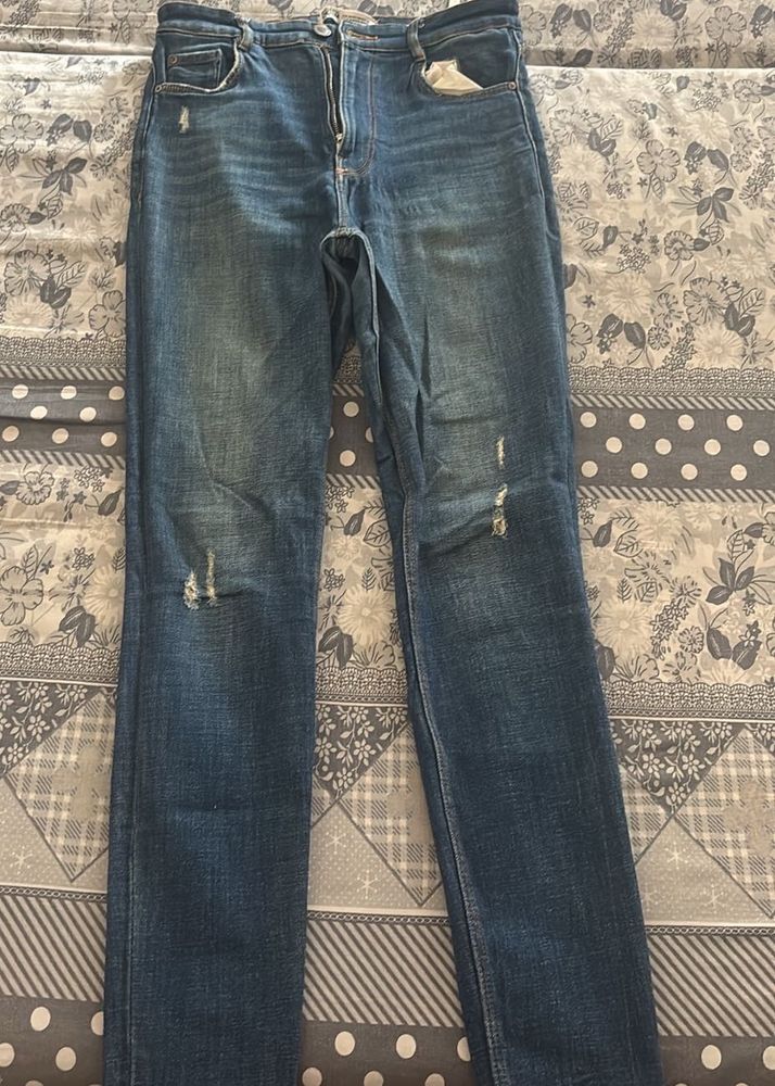 Blue Distressed Denim Jeans