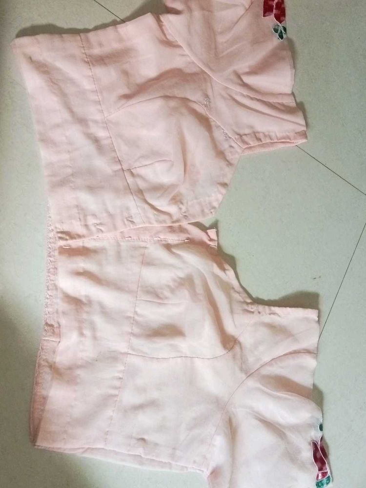 Elegant Pink Blouse with Floral Accents