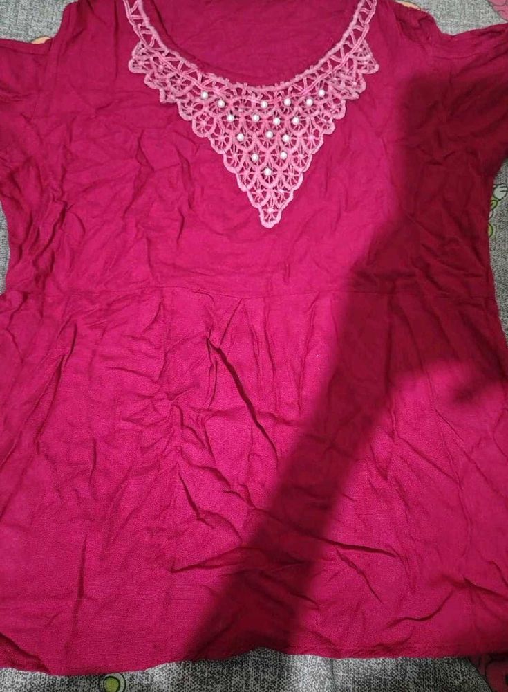 Beautiful Pink Kurti with Embellished Neckline