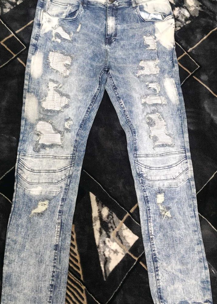 Distressed Denim Jeans