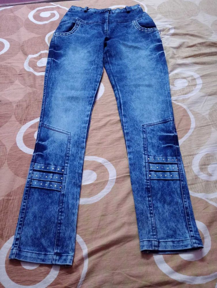 Stylish Blue Wash Jeans with Embellished Details