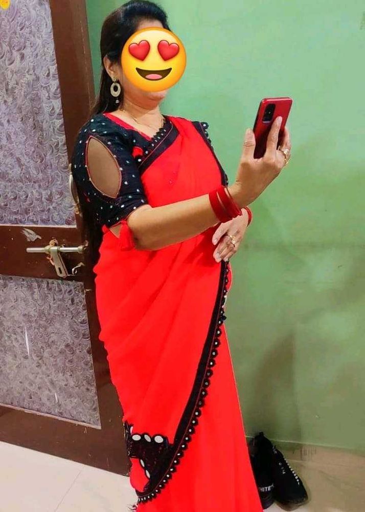 Vibrant Red Saree with Black Embellished Blouse