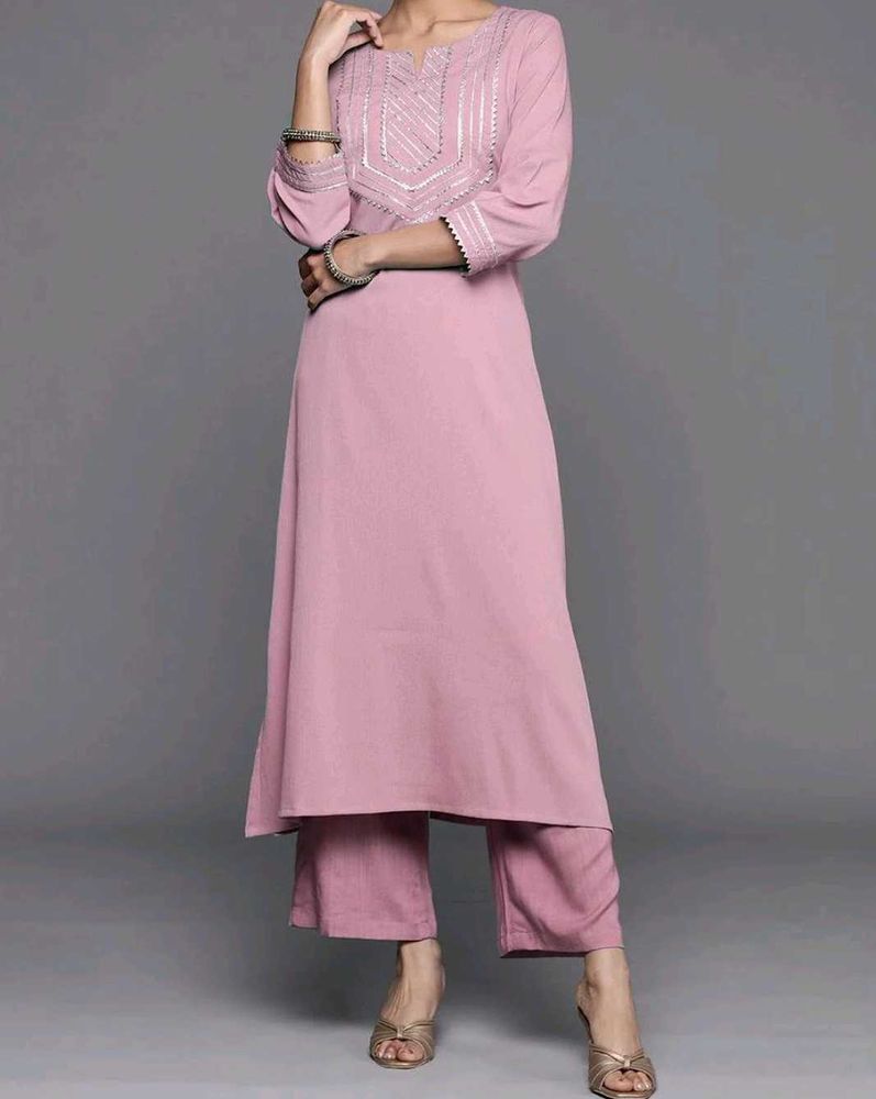 Elegant pastel Pink Kurta with Embellished Necklin