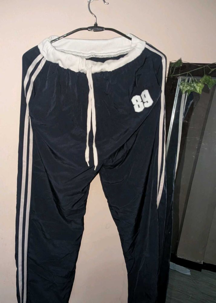 Blue Athletic Pants with White Stripes